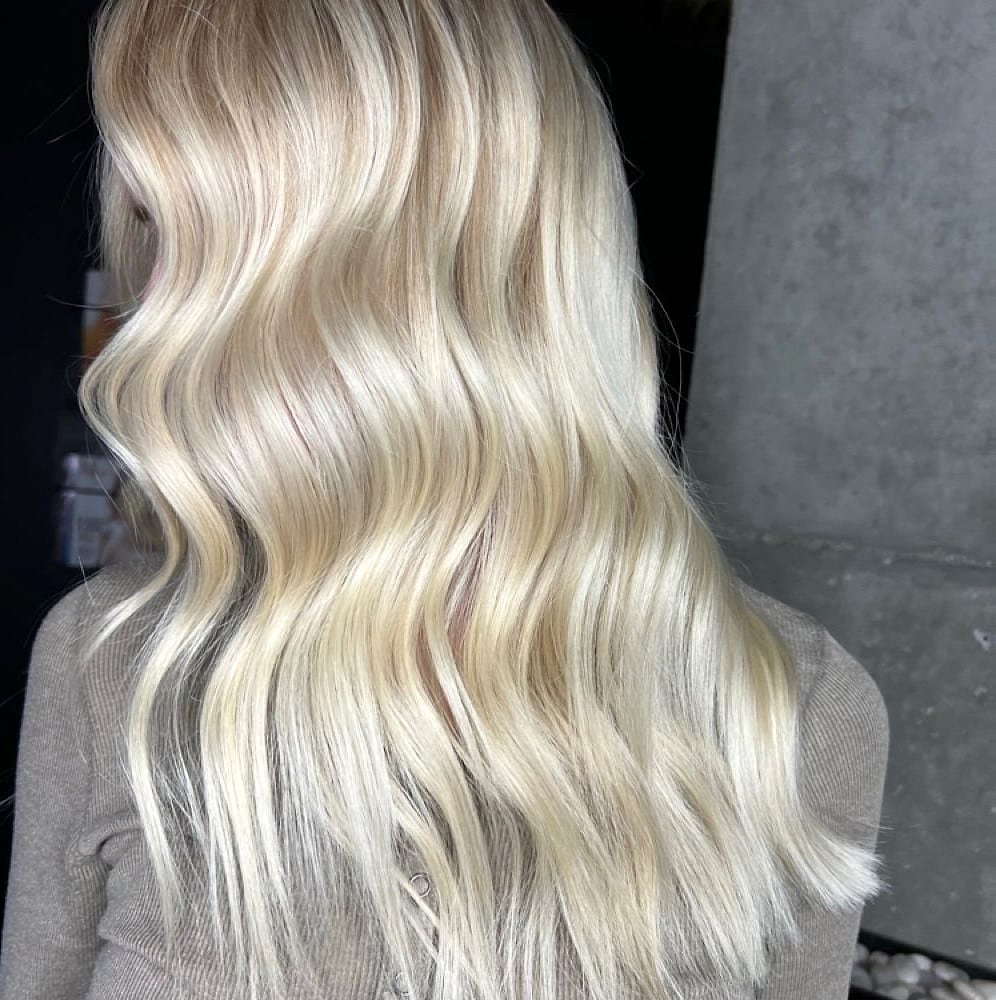 Back view of wavy platinum blonde hair